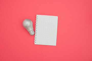  Idea A6 notebook wire binding mock up blank template design idea. Gray light bulb mockup against...
