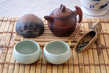 Tea set, on a wooden table of bamboo