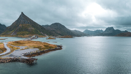 the Volandstinden mountain on the Lofoten islands and the Road to Fredvang and the fjord panorama