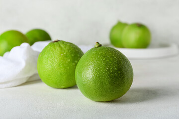 Juicy bergamot fruits on light background