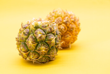 fresh pineapple isolated on yellow background, Fruits rich in vitamin C.
