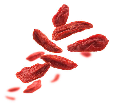 Dry Goji berries levitate on a white background