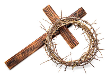 Crown of thorns with wooden cross on white background