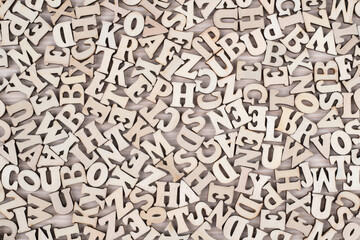 Vintage Bright Wooden Letters Background. Back to school concept.