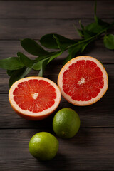 citrus fruits on wooden background