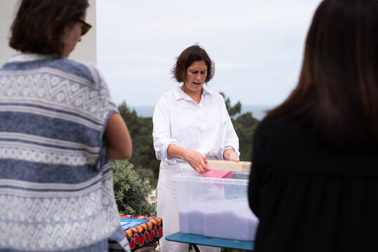Artisan teaching the art of papier mach&eacute;