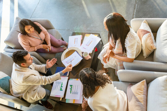 Young businesspeople having casual meeting at office