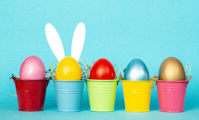 colored Easter eggs. happy Easter blue background with Top view with copy space