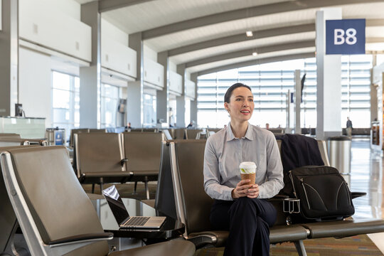 Woman Waiting at the Airport Lounge