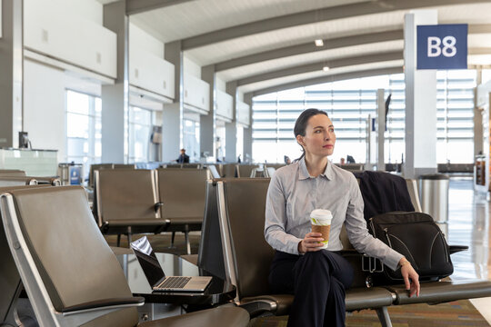Woman Waiting Patiently at Airport