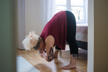 CUrvy model yoga at home