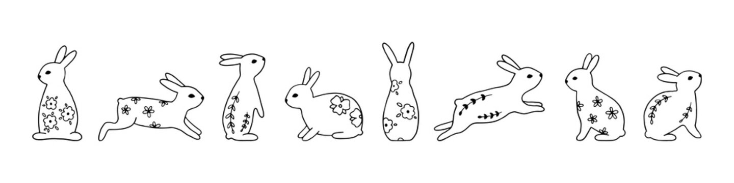 Set of line art Easter bunnies with floral elements in black. Hand drawn vector collection with cute festive rabbits for spring design and Easter holidays. Charming Easter traditional elements