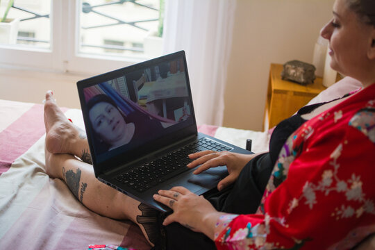 Friends catching up online on video call
