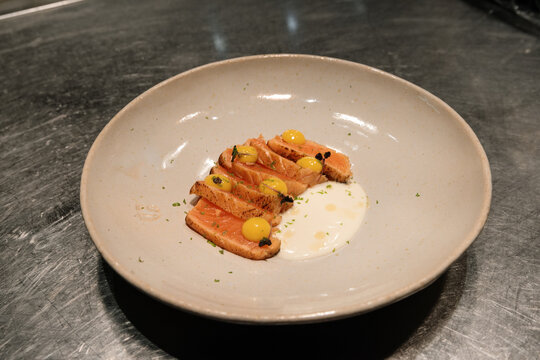 Salmon with quail egg yolks
