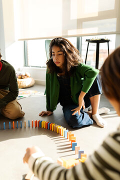 Children doing circuit with dominoes on a playdate