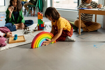 Kids playing with colorful toys on a playdate