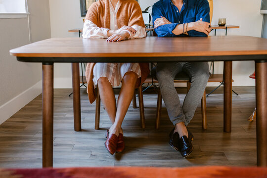 Cropped view Eames style couple at home