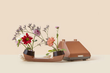 Spring flowers blooming inside retro style telephone