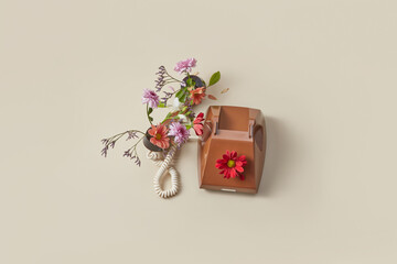 Rotary telephone with fresh spring flowers