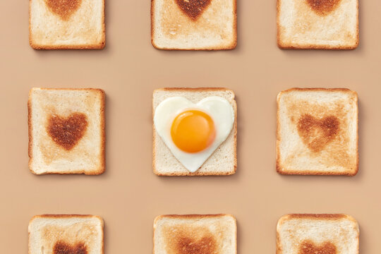 Sandwiches with burnt hearts and egg