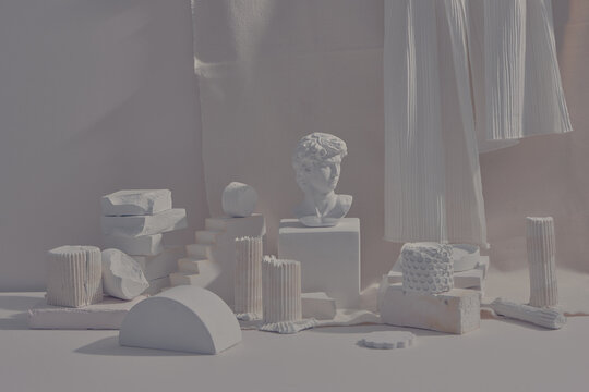 white decorative sculptural bust on a plaster