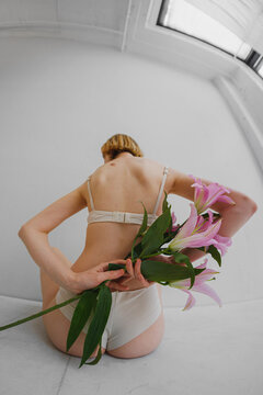 Albino woman with flowers