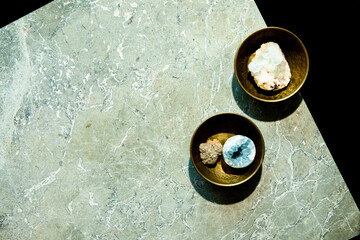 Home decor objects on stone surface