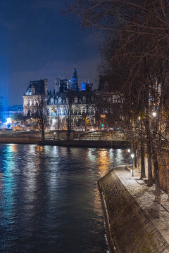 Water near buildings in night city