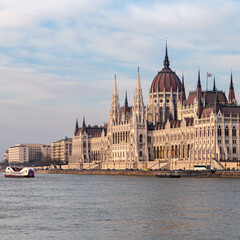 Fototapeta premium view from the Danube river to the beautiful Gothic building of the Hungarian Parliament as a symbol of the Hungarian capital