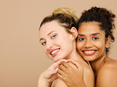 2 woman smiling