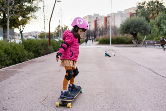 Little girl on a skate outdoors 