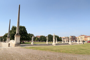 Large square Prato della Valle with obelisks and statues in Padua, Italy