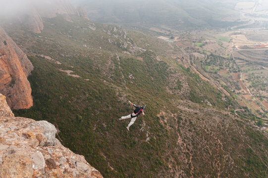 BASE jumper ready to take off from summit
