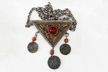Ankara, Turkey- March 03 2022: Old and worn metal muska cover. Muska an object in the shape of a...