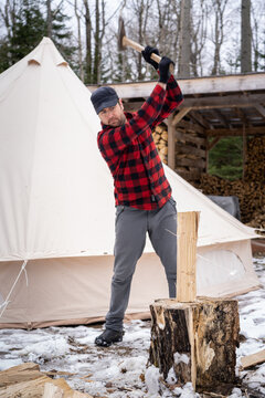 Wilderness Splitting Fire Wood With Axe Canvas Tent