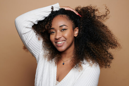 Black Curly Hair Woman  with white top