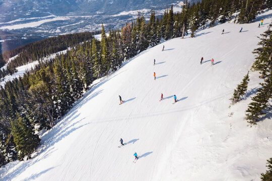 people skiing in the mountains