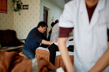 Group Of Blind Massage Therapists At Work