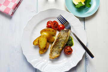 Cod fillet with potatoes and salsa verde