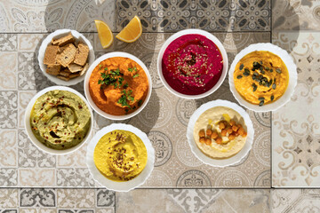 Healthy food : colorful hummus bowls