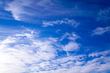 Beautiful blue sky background with white clouds for design