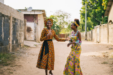 African girls walking in village