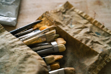 A close-up view of paintbrushes