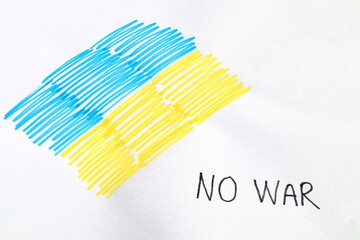 Ukraine peace symbol. Hand drawn with real pencil on traditional paper. Concept of anti war protest. Close up and isolated against a white background.