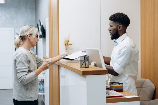 Mature white woman patient at dental clinic