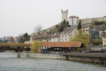 Roofed Spreuer bridge, houses and part of the Musegg Wall, Lucerne.