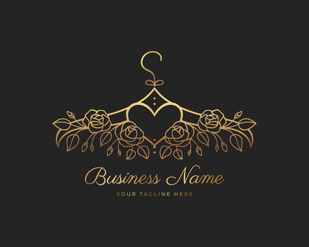 Hanger logo design with golden roses and a heart in the middle. Element for Atelier, wedding boutique, women's clothing store and fashion designer