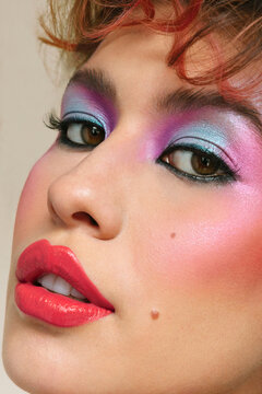 Portrait of a serious woman with an eighties look