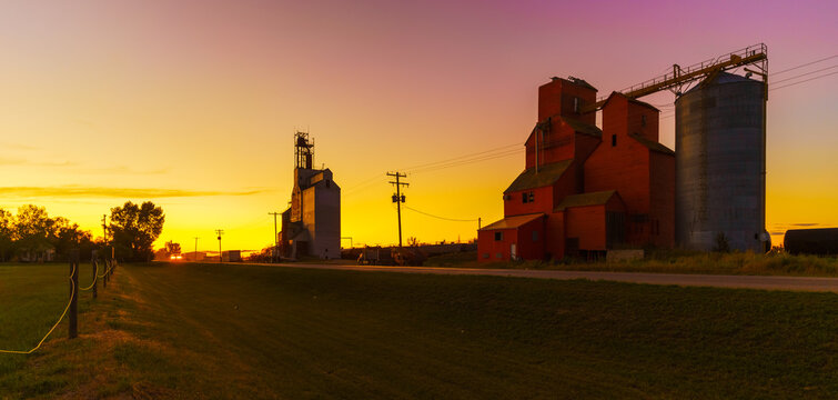 grain elevator in sunset