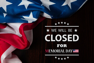 Memorial Day Background Design. American flag on a background of wooden teable with a message. We...